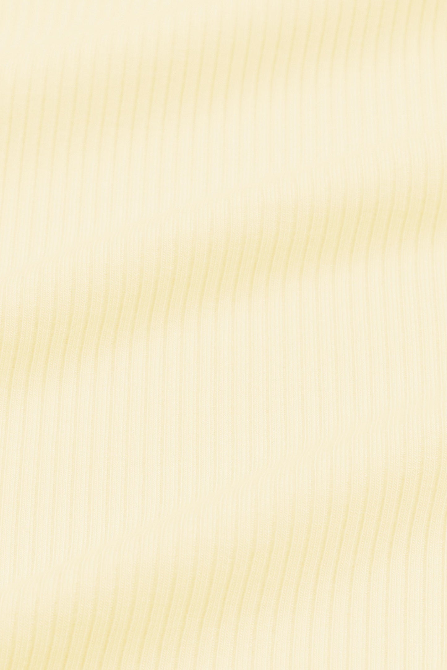 Ribbed Ruffle Zipper Footie in Chamomile